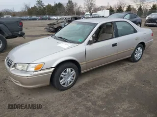 2001 Toyota Camry CE with VIN 4T1BG22K51U046766, listed as a IAAI auction lot 41674202 with 148,581 mi miles. Bid and sale history available at carsss.com. Image 2.