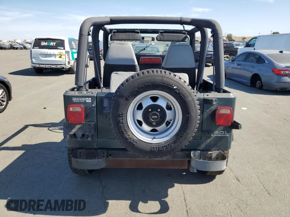 1994 Jeep Wrangler with VIN 1J4FY29S0RP422853, listed as a Copart auction lot 74611684 with 172,177 mi miles and Salvage Title. Bid and sale history available at carsss.com. Image 6.
