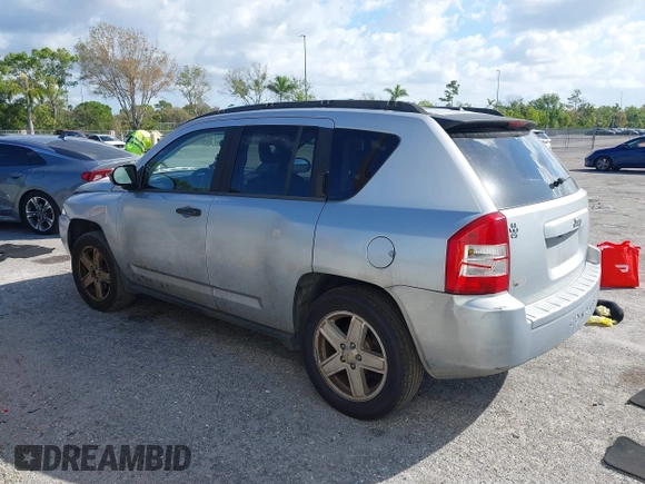2007 Jeep Compass Sport with VIN 1J8FT47W57D185807, listed as a IAAI auction lot 41700283 with 194,339 mi miles. Bid and sale history available at carsss.com. Image 3.
