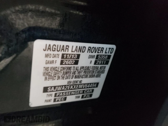 2014 Jaguar XJ with VIN SAJWA2EKXEMV64494, listed as a Copart auction lot 82634004 with 119,811 mi miles and Clean title. Bid and sale history available at DreamBid. Image 12.