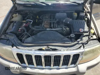 1999 Jeep Grand Cherokee Laredo with VIN 1J4GW58S1XC775877, listed as a Copart auction lot 55639795 with 197,611 mi miles and Salvage title. Bid and sale history available at DreamBid. Image 12.