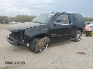 2012 Cadillac Escalade Premium z VIN 1GYS4CEF4CR196028, wystawiony jako Copart lot #51113885 z przebiegiem 196 113 mil mil oraz Szkody całkowita. Historia ofert i sprzedaży dostępna na DreamBid. Obrazek 1.