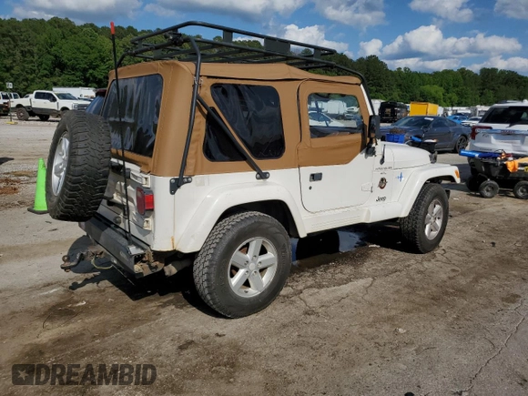 2000 Jeep Wrangler Sahara with VIN 1J4FA59S8YP721771, listed as a Copart auction lot 56924475 with 175,456 mi miles and Clean title. Bid and sale history available at DreamBid. Image 3.