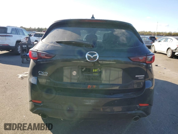 2023 Mazda CX-5 Signature with VIN JM3KFBXYXP0130139, listed as a Copart auction lot 88321445 with 22,911 mi miles and Salvage Title. Bid and sale history available at carsss.com. Image 6.