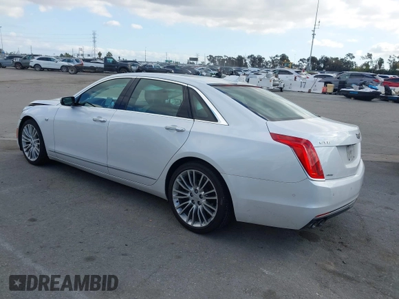 2016 Cadillac CT6 Luxury AWD with VIN 1G6KD5RSXGU154557, listed as a IAAI auction lot 41550199 with 102,536 mi miles and . Bid and sale history available at DreamBid. Image 3.