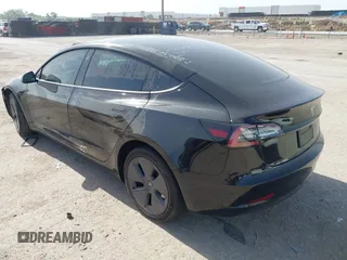 2023 Tesla Model 3 z VIN 5YJ3E1EA7PF465540, wystawiony jako IAAI lot #42261848 z przebiegiem 15 885 mil mil oraz . Historia ofert i sprzedaży dostępna na DreamBid. Obrazek 3.