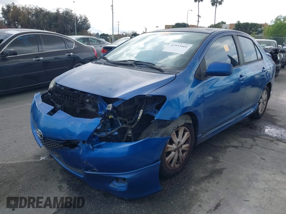 2009 Toyota Yaris with VIN JTDBT903591323255, listed as a IAAI auction lot 41933401 with 88,558 mi miles and . Bid and sale history available at DreamBid. Image 2.