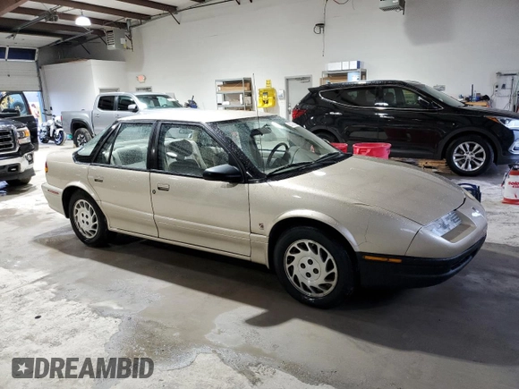 1995 Saturn SL with VIN 1G8ZK5271SZ238117, listed as a Copart auction lot 83723624 with 80,535 mi miles and Clean title. Bid and sale history available at DreamBid. Image 4.