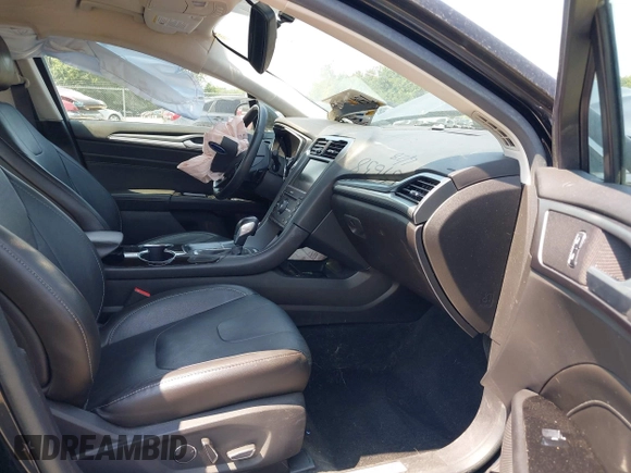 2016 Ford Fusion Titanium z VIN 3FA6P0K97GR174228, wystawiony jako IAAI lot #42636326 z przebiegiem 110 288 mil mil oraz . Historia ofert i sprzedaży dostępna na DreamBid. Obrazek 5.