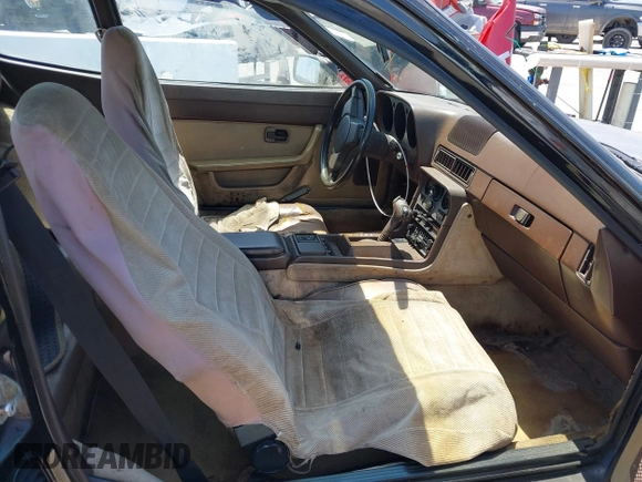 1984 Porsche 944 with VIN WP0AA0947EN459060, listed as a IAAI auction lot 42215176 with 43,863 mi miles and . Bid and sale history available at carsss.com. Image 5.