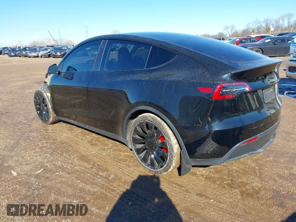 2022 Tesla Model Y Performance with VIN 7SAYGDEFXNF313636, listed as a IAAI auction lot 41660019 with 30,258 mi miles and . Bid and sale history available at DreamBid. Image 3.