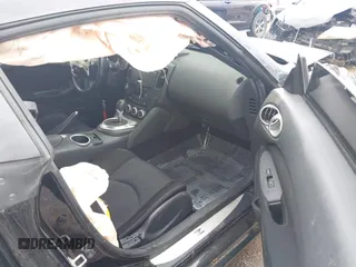 2020 Nissan 370Z Sport z VIN JN1AZ4EH6LM823399, wystawiony jako IAAI lot #42135621 z przebiegiem 98 855 mil mil oraz . Historia ofert i sprzedaży dostępna na DreamBid. Obrazek 5.