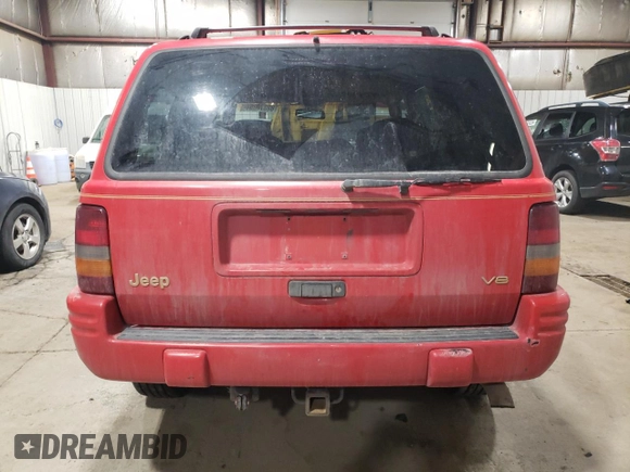 1996 Jeep Grand Cherokee Limited with VIN 1J4GZ78Y3TC186413, listed as a Copart auction lot 82370854 with 261,630 mi miles and Salvage Title. Bid and sale history available at carsss.com. Image 6.