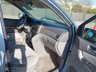 2009 Toyota Sienna CE with VIN 5TDZK23C19S268830, listed as a IAAI auction lot 42032259 with 113,596 mi miles. Bid and sale history available at carsss.com. Image 5.