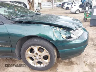1998 Chrysler Sebring JXi with VIN 3C3EL55H6WT232076, listed as a IAAI auction lot 41906230 with 54,718 mi miles and . Bid and sale history available at DreamBid. Image 12.