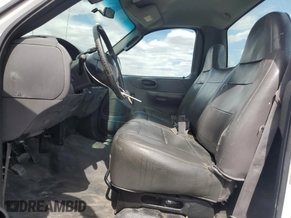 2004 Ford F-150 XL with VIN 2FTRF17294CA59985, listed as a Copart auction lot 55296195 with 220,933 mi miles and Salvage title. Bid and sale history available at DreamBid. Image 7.