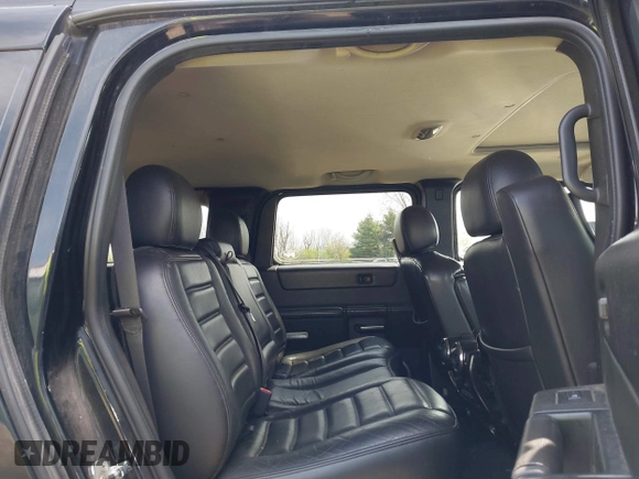 2007 Hummer H2 SUV z VIN 5GRGN23UX7H112972, wystawiony jako IAAI lot #41980625 z przebiegiem 214 857 mil mil oraz . Historia ofert i sprzedaży dostępna na DreamBid. Obrazek 8.