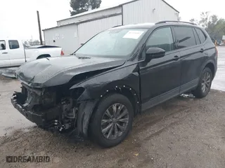 2018 Volkswagen Tiguan S with VIN 3VV1B7AX0JM101932, listed as a IAAI auction lot 41725112 with 143,780 mi miles. Bid and sale history available at carsss.com. Image 2.