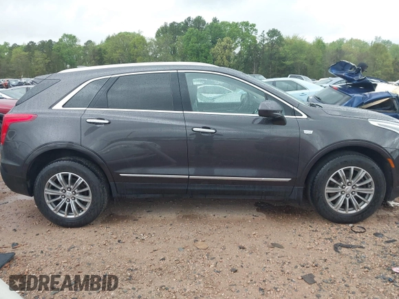 2019 Cadillac XT5 Luxury AWD z VIN 1GYKNDRS6KZ113420, wystawiony jako IAAI lot #41951065 z przebiegiem 56 360 mil mil oraz . Historia ofert i sprzedaży dostępna na DreamBid. Obrazek 13.