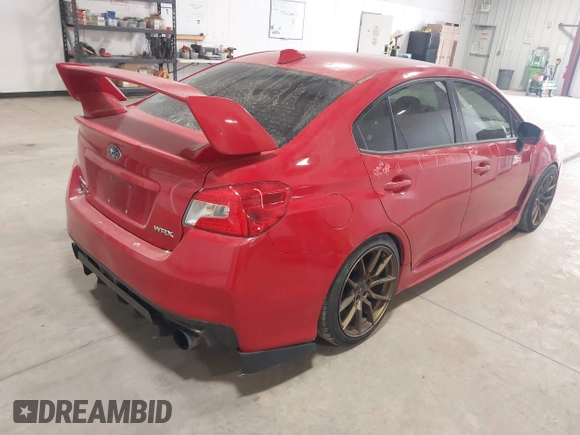 2015 Subaru WRX Premium with VIN JF1VA1D66F8804732, listed as a IAAI auction lot 41558676 with 142,471 mi miles. Bid and sale history available at carsss.com. Image 4.