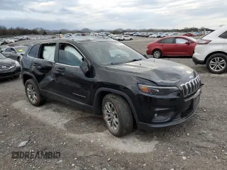 2019 Jeep Cherokee Latitude Plus with VIN 1C4PJMLBXKD214974, listed as a Copart auction lot 49877595 with 120,979 mi miles and Salvage title. Bid and sale history available at DreamBid. Image 4.