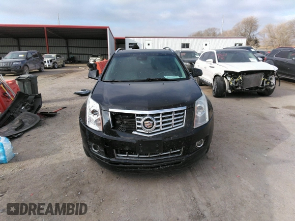 2016 Cadillac SRX Performance Collection z VIN 3GYFNCE32GS505552, wystawiony jako IAAI lot #40949642 z przebiegiem 143 343 mil mil oraz . Historia ofert i sprzedaży dostępna na DreamBid. Obrazek 12.