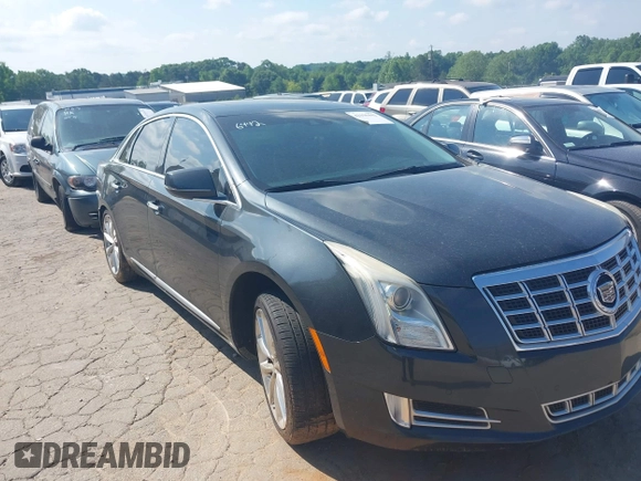 2013 Cadillac XTS Luxury z VIN 2G61P5S37D9110658, wystawiony jako IAAI lot #42196442 z przebiegiem 182 228 mil mil oraz . Historia ofert i sprzedaży dostępna na DreamBid. Obrazek 1.