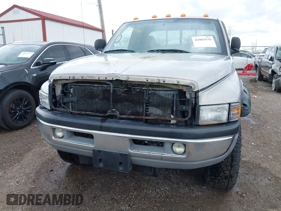 2000 Dodge 2500 with VIN 3B7KF2362YG124961, listed as a IAAI auction lot 42082636 with Not Provided miles and . Bid and sale history available at DreamBid. Image 6.