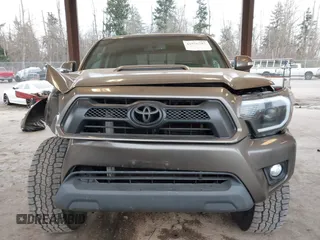 2013 Toyota Tacoma z VIN 3TMLU4EN9DM124980, wystawiony jako IAAI lot #41576747 z przebiegiem 209 883 mil mil oraz . Historia ofert i sprzedaży dostępna na DreamBid. Obrazek 12.