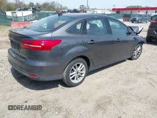 2017 Ford Focus SE with VIN 1FADP3F20HL335881, listed as a IAAI auction lot 42074241 with 127,741 mi miles. Bid and sale history available at carsss.com. Image 4.