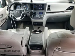 2015 Toyota Sienna XLE with VIN 5TDYK3DC0FS592251, listed as a Copart auction lot 60126165 with 118,925 mi miles and Salvage title. Bid and sale history available at DreamBid. Image 8.