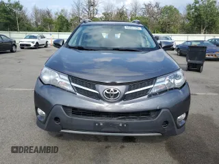 2015 Toyota RAV4 Limited with VIN JTMDFREV3FJ026913, listed as a Copart auction lot 65201135 with 74,354 mi miles and Salvage title. Bid and sale history available at DreamBid. Image 5.