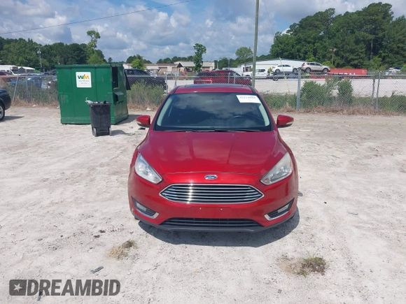 2018 Ford Focus Titanium z VIN 1FADP3J23JL295888, wystawiony jako IAAI lot #42524088 z przebiegiem 108 812 mil mil oraz . Historia ofert i sprzedaży dostępna na DreamBid. Obrazek 12.