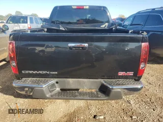 2011 GMC Canyon SLE1 with VIN 1GTH6MFE1B8128778, listed as a Copart auction lot 72456434 with 63,849 mi miles and Salvage Title. Bid and sale history available at carsss.com. Image 6.