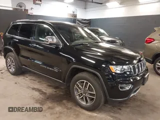 2021 Jeep Grand Cherokee 80th Anniversary z VIN 1C4RJFBGXMC877410, wystawiony jako IAAI lot #40141255 z przebiegiem 34 361 mil mil oraz . Historia ofert i sprzedaży dostępna na DreamBid. Obrazek 1.