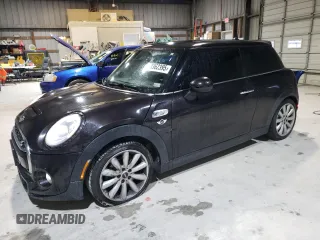 2014 MINI Hardtop S with VIN WMWXM7C50ET926209, listed as a Copart auction lot 89362395 with 82,989 mi miles and Salvage Title. Bid and sale history available at DreamBid. Image 1.