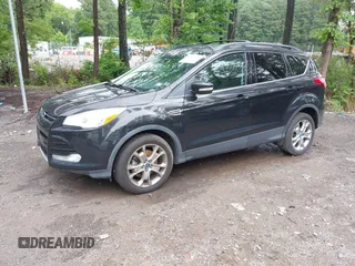 2013 Ford Escape SEL z VIN 1FMCU9H92DUA84826, wystawiony jako IAAI lot #42467606 z przebiegiem 172 334 mil mil oraz . Historia ofert i sprzedaży dostępna na DreamBid. Obrazek 2.