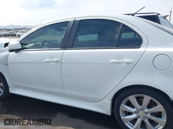 2013 Mitsubishi Lancer GT with VIN JA32U8FW7DU011260, listed as a IAAI auction lot 41233707 with 165,183 mi miles. Bid and sale history available at carsss.com. Image 14.