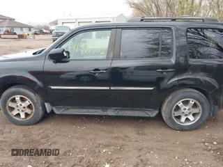 2009 Honda Pilot Touring with VIN 5FNYF48959B016978, listed as a IAAI auction lot 41947782 with 234,115 mi miles and . Bid and sale history available at carsss.com. Image 14.