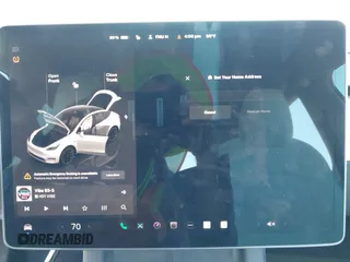 2022 Tesla Model Y Long Range z VIN 7SAYGDEE2NF420882, wystawiony jako IAAI lot #42023642 z przebiegiem 19 783 mil mil oraz . Historia ofert i sprzedaży dostępna na DreamBid. Obrazek 18.