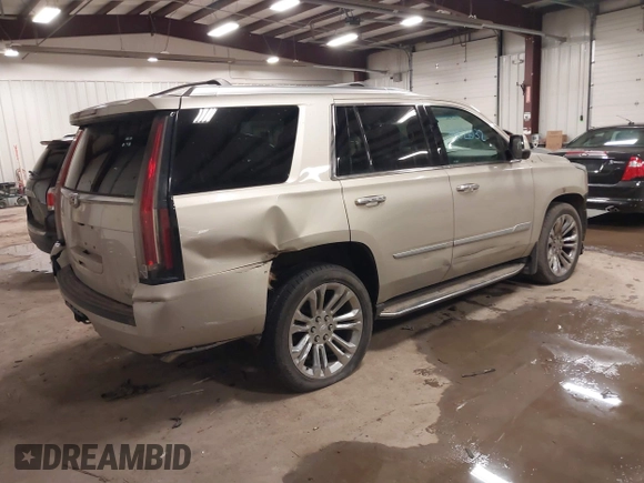 2017 Cadillac Escalade Premium Luxury z VIN 1GYS4CKJ9HR390988, wystawiony jako IAAI lot #41626132 z przebiegiem 166 185 mil mil oraz . Historia ofert i sprzedaży dostępna na DreamBid. Obrazek 4.