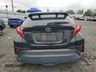 2019 Toyota C-HR XLE z VIN JTNKHMBX8K1055954, wystawiony jako Copart lot #53290965 z przebiegiem 63 265 mil mil oraz Szkoda całkowita • Salvage title. Historia ofert i sprzedaży dostępna na DreamBid. Obrazek 6.