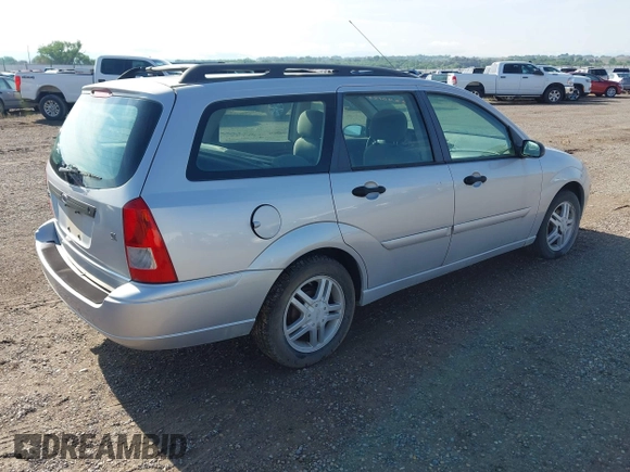 2001 Ford Focus SE z VIN 1FAFP363X1W343475, wystawiony jako IAAI lot #42390133 z przebiegiem 127 282 mil mil oraz . Historia ofert i sprzedaży dostępna na DreamBid. Obrazek 4.