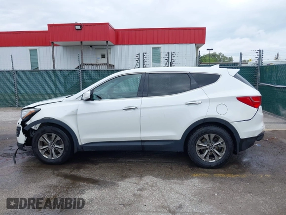 2014 Hyundai Santa Fe z VIN 5XYZTDLB5EG147354, wystawiony jako IAAI lot #42235940 z przebiegiem 107 466 mil mil oraz . Historia ofert i sprzedaży dostępna na DreamBid. Obrazek 14.