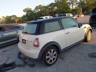 2011 MINI Hardtop with VIN WMWSU3C58BT097825, listed as a IAAI auction lot 42040442 with 141,978 mi miles and . Bid and sale history available at DreamBid. Image 4.