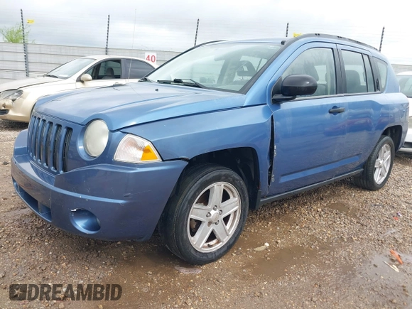 2007 Jeep Compass Sport with VIN 1J8FT47W57D215243, listed as a IAAI auction lot 41925203 with 255,193 mi miles. Bid and sale history available at carsss.com. Image 2.