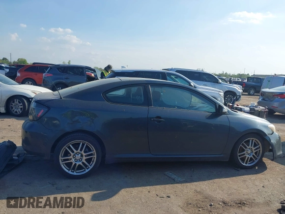 2005 Scion tC with VIN JTKDE177150041877, listed as a IAAI auction lot 41877581 with 240,179 mi miles. Bid and sale history available at carsss.com. Image 13.