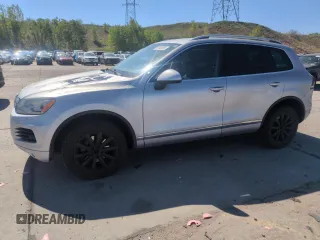 2012 Volkswagen Touareg Sport z VIN WVGFK9BP8CD005068, wystawiony jako Copart lot #56140995 z przebiegiem 158 390 mil mil oraz Szkoda całkowita • Salvage title. Historia ofert i sprzedaży dostępna na DreamBid. Obrazek 1.