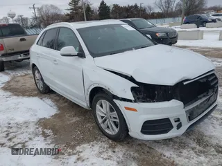 2017 Audi Q3 Premium Plus z VIN WA1JCCFS6HR008921, wystawiony jako IAAI lot #41351675 z przebiegiem 117 158 mil mil oraz . Historia ofert i sprzedaży dostępna na DreamBid. Obrazek 1.