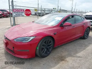 2022 Tesla Model S with VIN 5YJSA1E58NF486727, listed as a IAAI auction lot 42139418 with Not provided miles and . Bid and sale history available at DreamBid. Image 2.